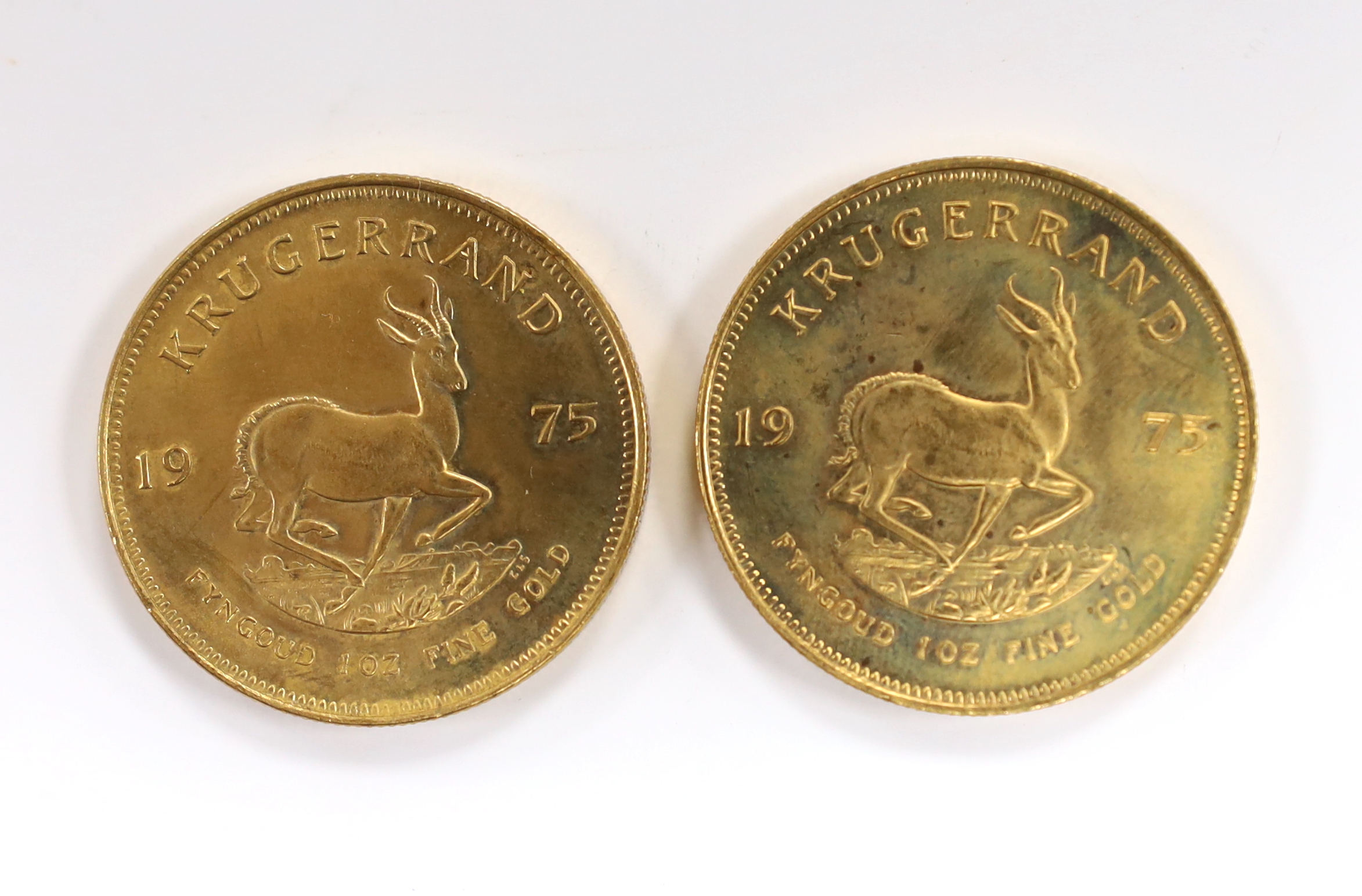 Gold coins, South Africa, two gold 1oz. Krugerrands, 1975, near UNC (2oz.)